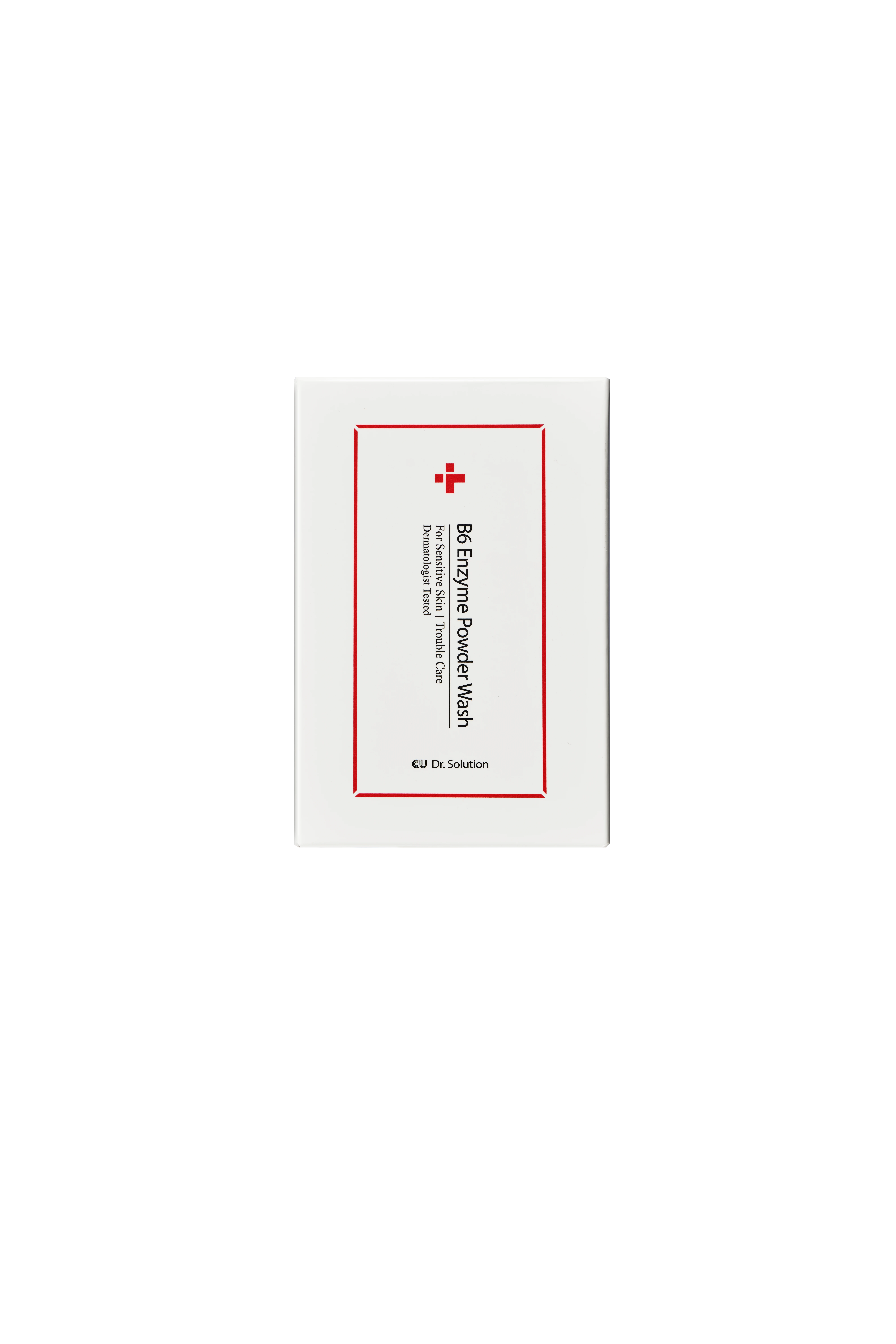 White cardboard box displaying product label: B6 Enzyme Powder Wash with red border and small cross logo at the top center (cosmetic item).