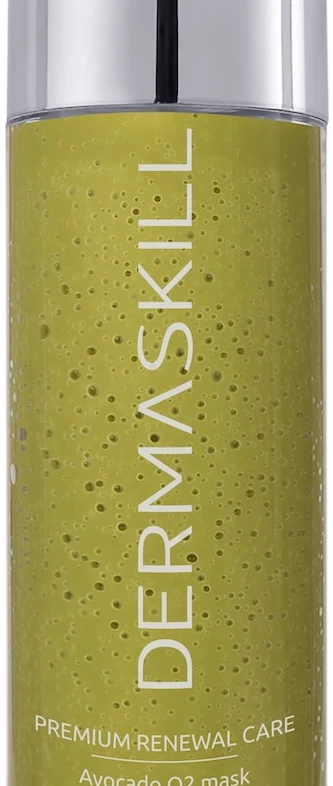 Green avocado O2 mask bottle with a silver cap, labeled DerMaskil Premium Renewal Care (50 ml).