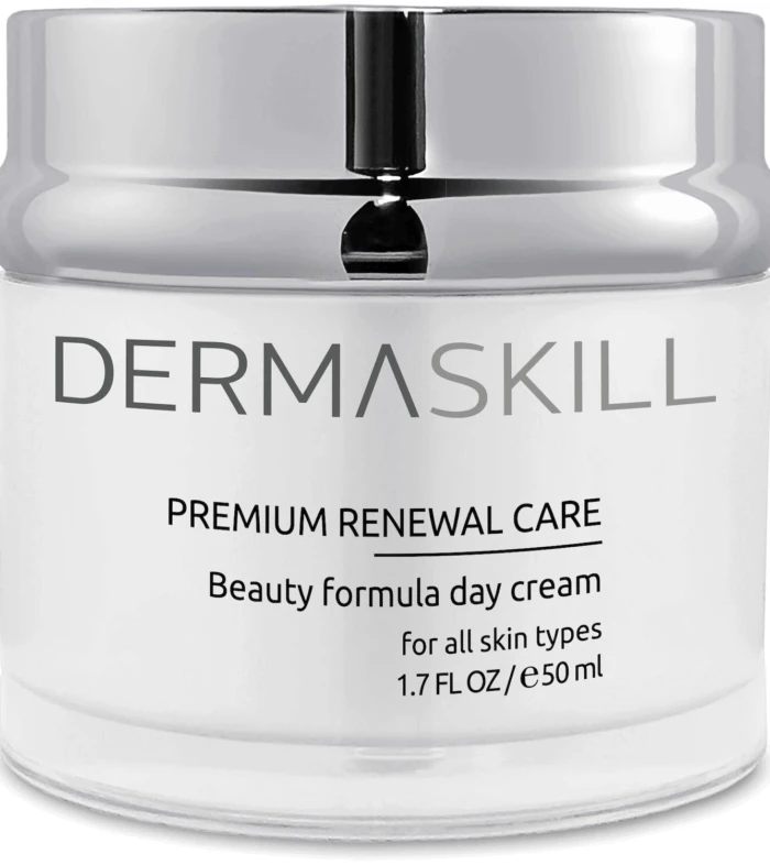 Close-up of a white cosmetic jar with a shiny silver cap labeled DERMASKILL Premium Renewal Care Day Cream for all skin types (1.7 fl oz / 50 ml).