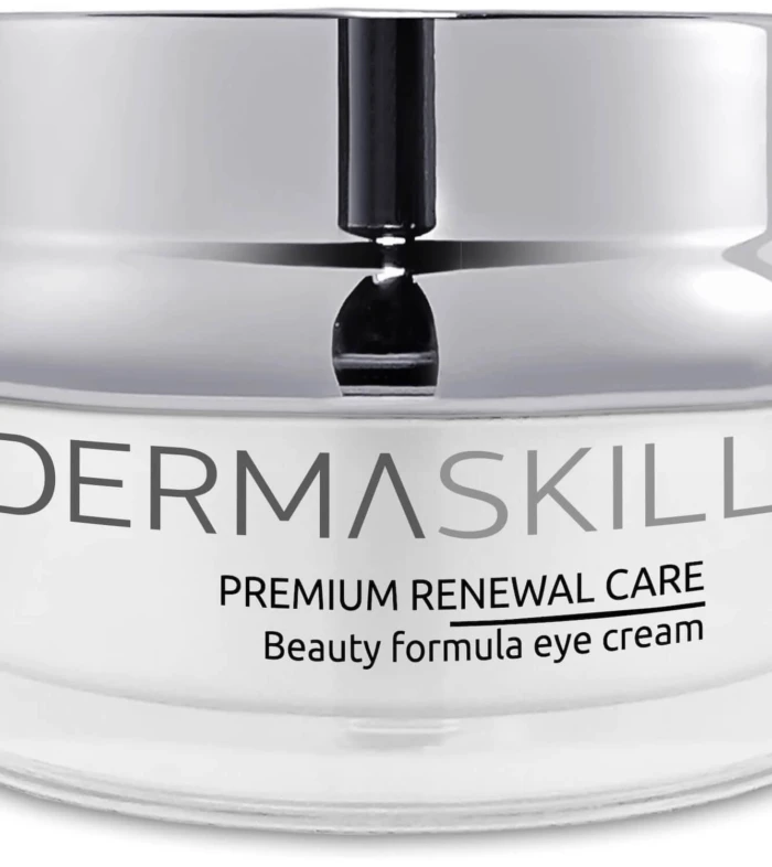 Cosmetic jar labeled DERMASKILL with a silver cap, promoting Premium Renewal Care eye cream on the label