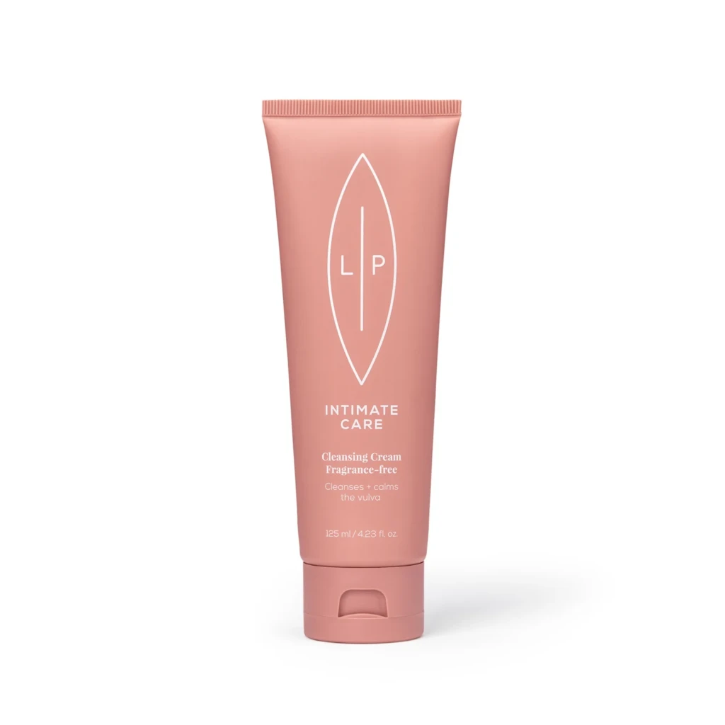 Peach-pink tube of LP Intimate Care cleansing cream, fragrance-free, with white logo and text.