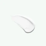 White cream smear sweeping diagonally across a pale mint background on a minimalist surface.