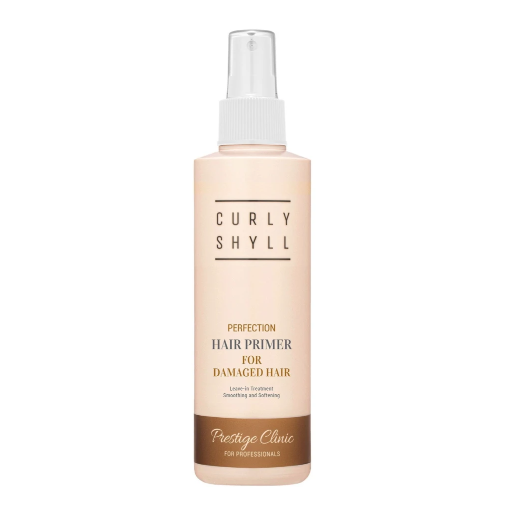 Beige cylindrical hair primer bottle with spray nozzle, labeled Perfection Hair Primer for damaged hair, Prestige Clinic for professionals (front view)