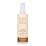 Beige cylindrical hair primer bottle with spray nozzle, labeled Perfection Hair Primer for damaged hair, Prestige Clinic for professionals (front view)