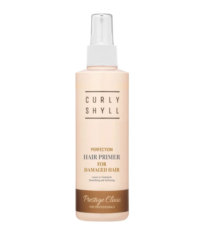 Beige cylindrical hair primer bottle with spray nozzle, labeled Perfection Hair Primer for damaged hair, Prestige Clinic for professionals (front view)