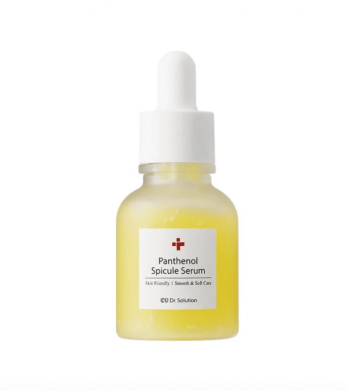 Dropper bottle of Panthenol Spicule Serum with yellow serum visible