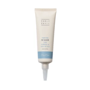 Cream-colored squeeze tube labeled HeadSpa with 'Purifying Scalp for normal & oily scalp' text and a blue bottom band.