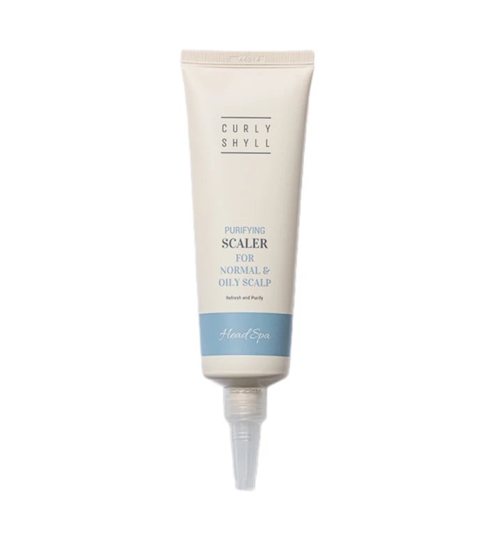 Cream-colored squeeze tube labeled HeadSpa with 'Purifying Scalp for normal & oily scalp' text and a blue bottom band.