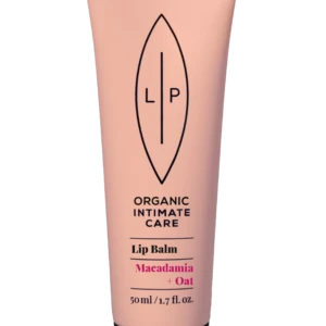 Pink lip balm tube with black cap, logo and product name visible: Organic Intimate Care Lip Balm in Macadamia + Oat, 50 ml/1.7 oz