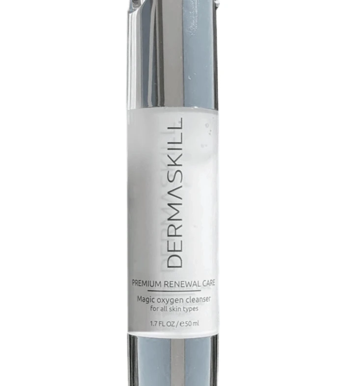 Dermaskill premium renewal care cleanser bottle with silver cap and white label, stating 'Magic oxygen cleanser' for all skin types (50 ml).