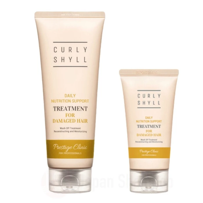 Two beige tubes of Curly Shyll hair treatment for damaged hair, with gold accent labels and 'Daily Nutrition Support' and 'Prestige Clinic' text on the packaging, set against a white background.