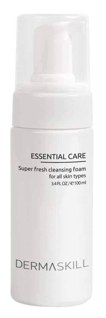 Dermaskill Essential Care cleansing foam bottle with pump dispenser; reads 'Super fresh cleansing foam for all skin types'.