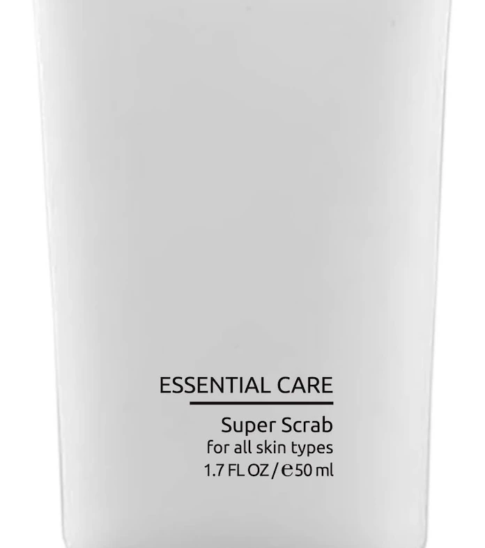 White skincare tube labeled Dermaskill Essential Care Super Scrub for all skin types with a silver cap