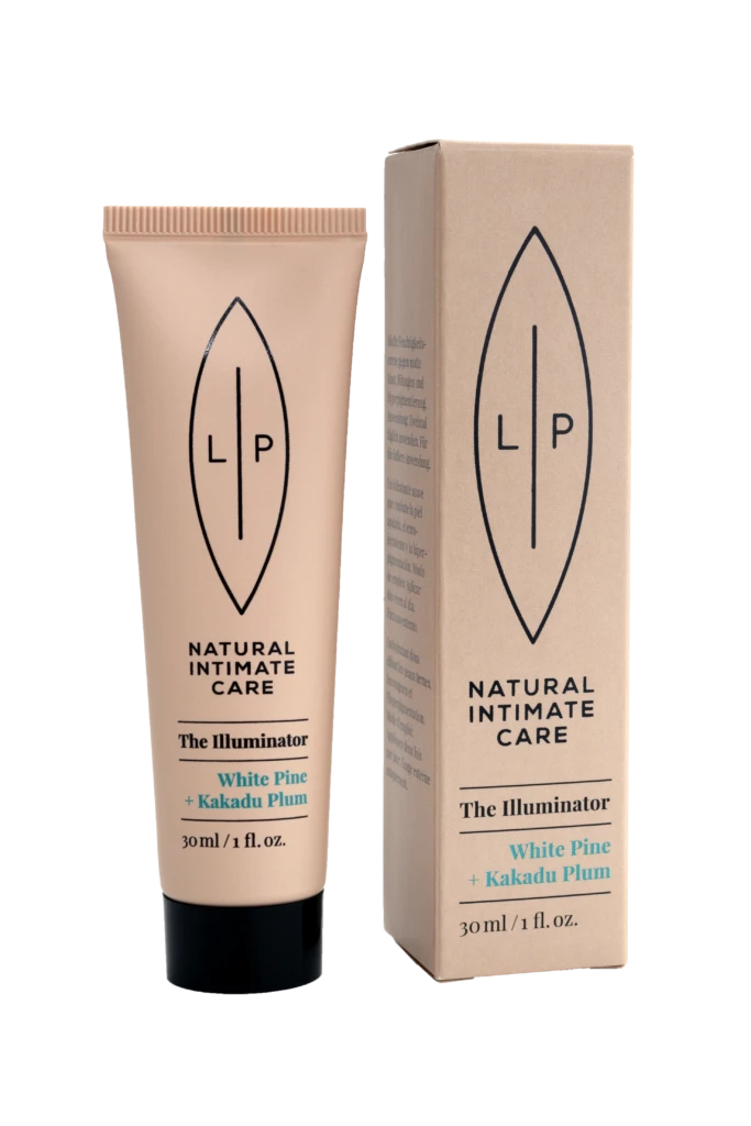 Beige LP Natural Intimate Care tube labeled The Illuminator with White Pine and Kakadu Plum next to its matching box.