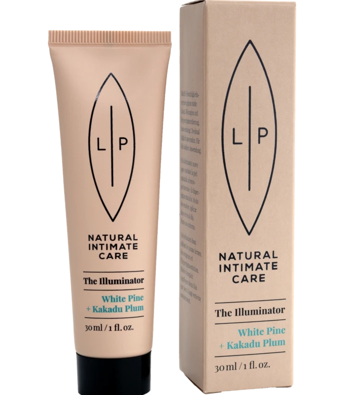Beige LP Natural Intimate Care tube labeled The Illuminator with White Pine and Kakadu Plum next to its matching box.
