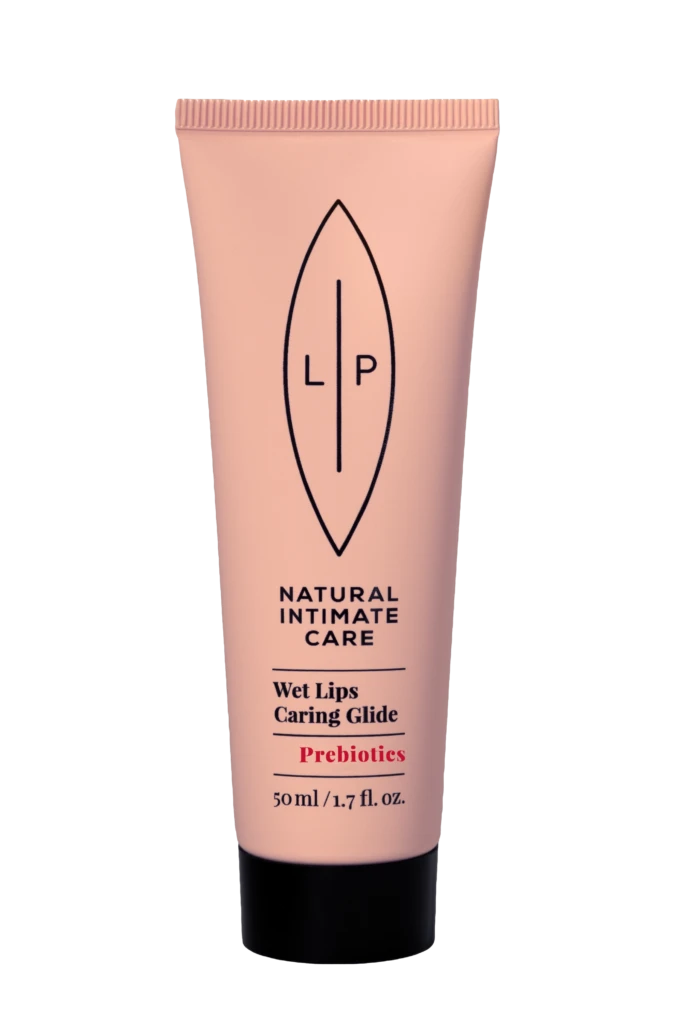Pink squeeze tube of natural intimate care product with LP logo and text 'Wet Lips Caring Glide' and 'Prebiotics' (50 ml)